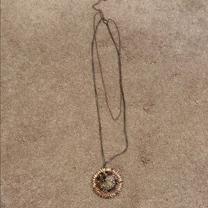 Elegant Gold and Silver Pendant Necklace